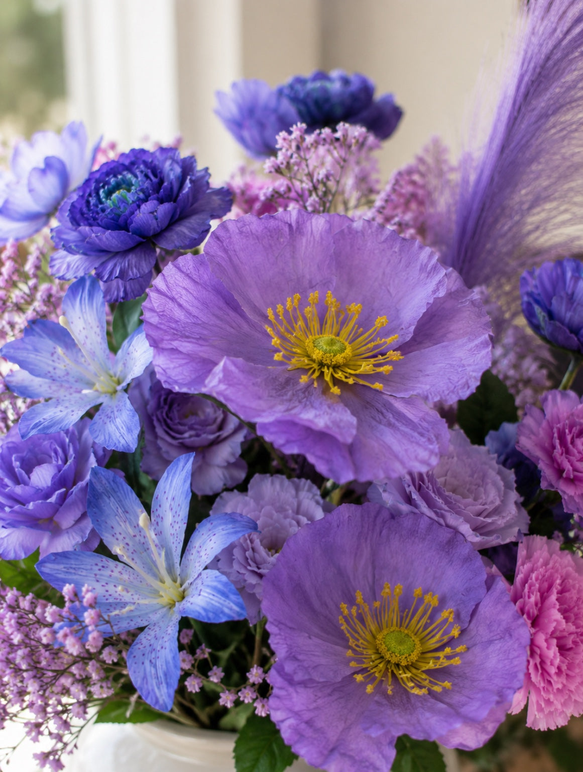 Close-up of the Water Lily Collection luxury artificial floral arrangement showcasing pastel lavender, lilac, blush pink and soft blue flowers with premium botanical details.